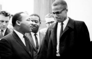 Photo of Martin Luther King and Malcolm X Talking