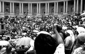 Female demonstrators march to the Union Buildings (official seat of the South African Government) during the 1956 Women’s March on August 9, in opposition to the 1952 pass laws.