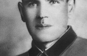 A photo portrait of a young, clean-shaven, white man in uniform 