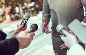 Reporters conducting an interview. 