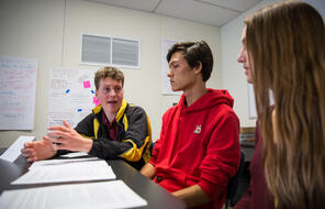 Students discuss ideas in class. 