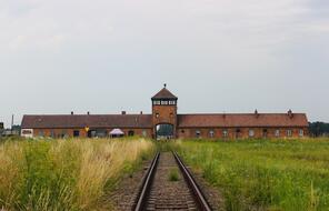 Color photograph of the Auschwitz-Birkenau Museum Gate From The Outside 