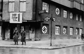 Nazi's standing outside of a building