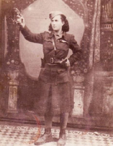 Formal full body photo portrait of a young white woman in uniform