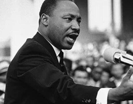 B&W photo of Martin Luther King Junior giving a speech