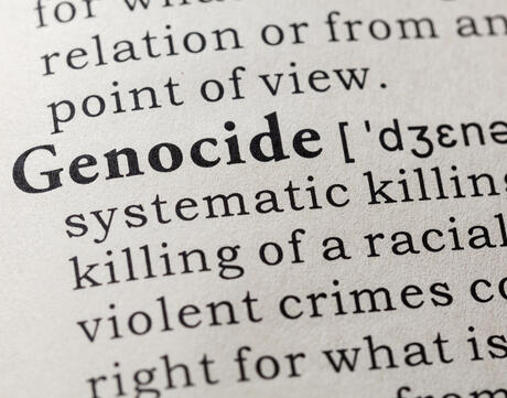 Definition of genocide stock photo.