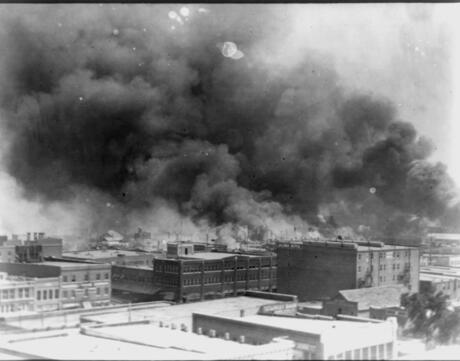 Burning buildings during the Tulsa Race Massacre, also called Tulsa Race Riot, when a white mob attacked the predominantly African American Greenwood neighborhood of Tulsa, Oklahoma.